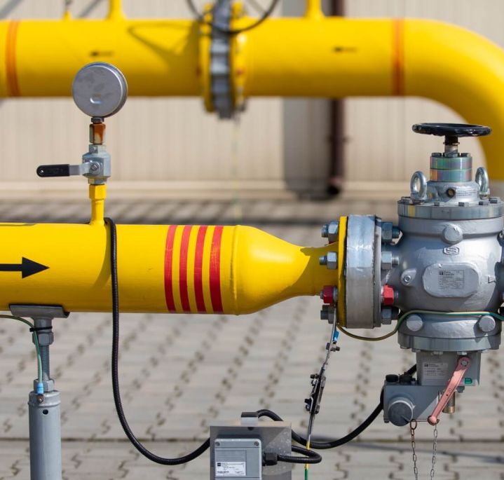 Gas pipeline, yellow pipes with pressure gauge and valve